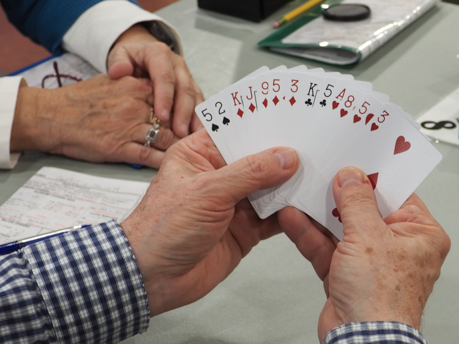 Hand of bridge cards